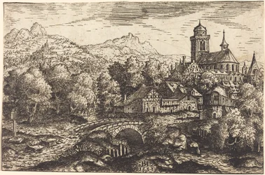 Paisaje montañoso con un pueblo