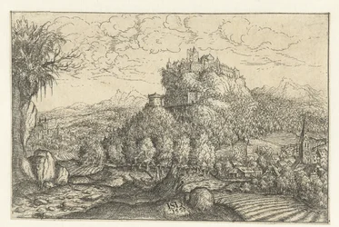Paisaje con un castillo en una montaña.