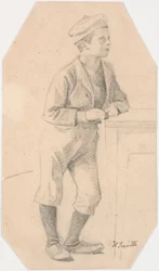 Niño apoyado en una mesa