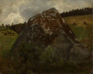 Bloque de roca en un valle cubierto de prados