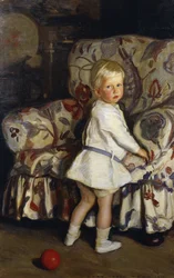 Niño joven en un interior