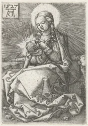 Madonna con niño en el pecho