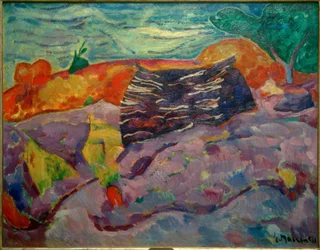 Paisaje con pila de madera