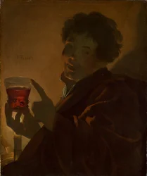 Niño con una copa de vino