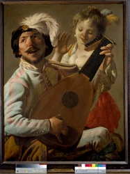 El dúo Un cantante tocando el laúd con una bailarina