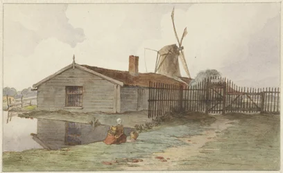 Molino con edificios de madera cerca de Ámsterdam