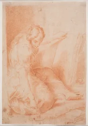 Mujer escribiendo en un folio. (Fama)