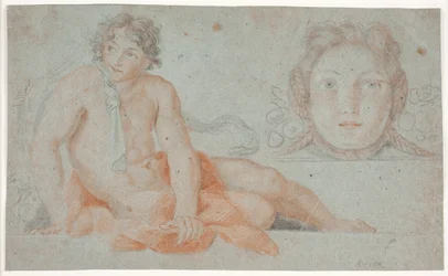 Joven desnudo y cabeza decorativa femenina