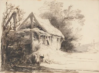 Un viejo granero, árboles y una vaca