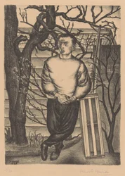 Hombre junto a un árbol