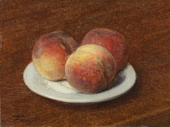 Tres duraznos en un plato