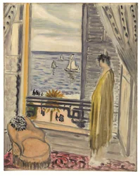 Mujer junto a la ventana