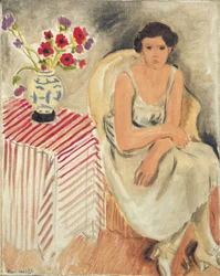 Mujer en una silla - Flores en la mesa, o claveles