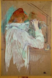 Mujer rizando su cabello