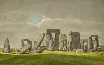 Stonehenge desde el sureste, mostrando piedras en estado ruinoso con 2 visitantes