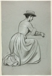 Mujer arrodillada con sombrero de paja