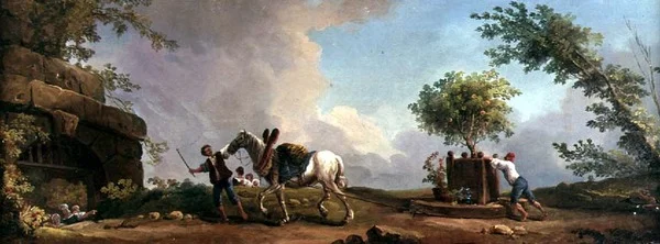 Jardineros transportando un naranjo