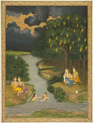 Mujeres disfrutando del río en el borde del bosque
