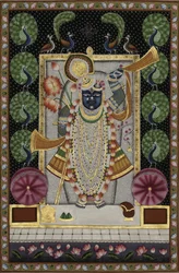 El señor Krishna con pavos reales