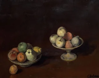 Frutero y plato de manzanas