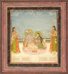 Krishna y Radha sentados en una terraza