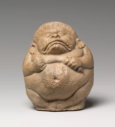Sonajero en Forma de Yaksha Grotesco Agachado (terracota)