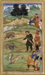 Salim, sosteniendo su rifle, señala a un nilgai muerto