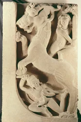 Guerreros luchando contra un león-grifo