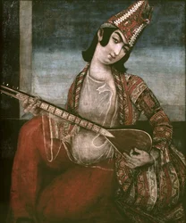 Joven mujer tocando una guitarra