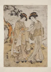 Dos mujeres leyendo una carta
