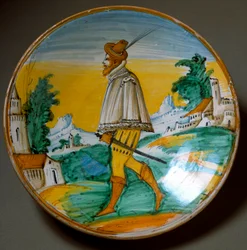 Joven armado. Plato de cerámica producido en Viterbo, Italia. Finales del siglo XVI. Florencia, Museo Nazionale del Bargello
