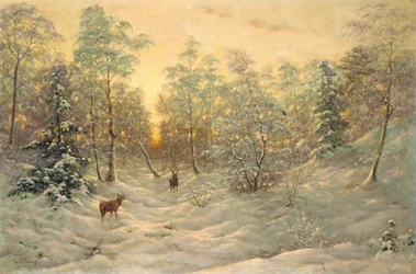 Ciervos en un paisaje nevado al anochecer