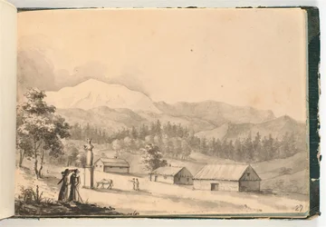 Paisaje montañoso con personas y casas