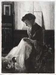 Retrato de perfil de una mujer cosiendo