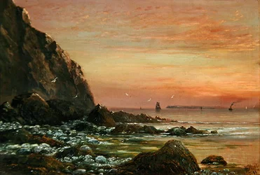Paisaje marino con acantilado al atardecer