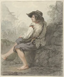Niño sentado con sombrero y piel de oveja, mirando hacia la izquierda