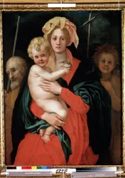 Virgen y Niño con San José y San Juan Bautista (Virgen y Niño con San José y San Juan Bautista). Cristo sostiene un pájaro en su mano. Pintura de Jacopo (Iacopo) Carrucci dit il Pontormo (Pontorme) (1494-1557), hacia 1520. Arte flora