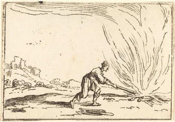 Hombre atendiendo un fuego