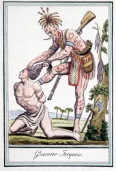 Guerrero iroqués escalpando a su enemigo - en “Encyclopedia of travels” de Grasset St Sauveur, París