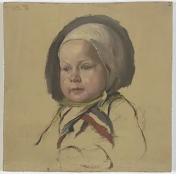 Niño pequeño con cofia blanca