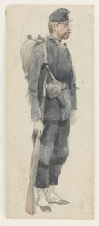 Un soldado llevando un rifle