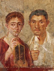 Fresco romano hallado en Pompeya que muestra a una pareja sosteniendo útiles de escritura. Museo Archeolo...
