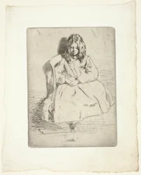 Annie, sentada