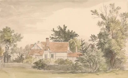 Cabañas y árboles con valla