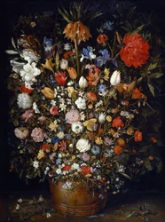 Flores en una vasija de madera
