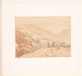 Paisaje de colinas con vista a un pueblo