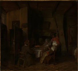 Una comida familiar en una cabaña campesina