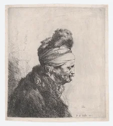 Busto de un anciano con gorro de piel