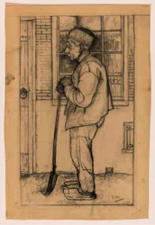 Douwe de perfil, con una pala frente a una casa