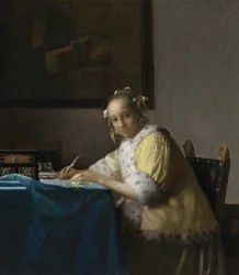 Una dama escribiendo